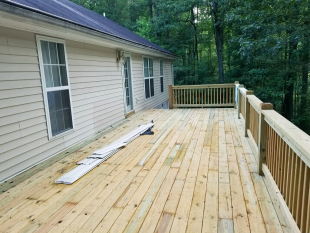 Deck rebuilt and enlarged by Gonzalez Landscaping and Home Improvement