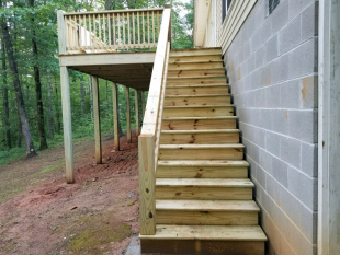 New stair case for rebuilt deck by Gonzalez Landscaping and Home Improvement. 